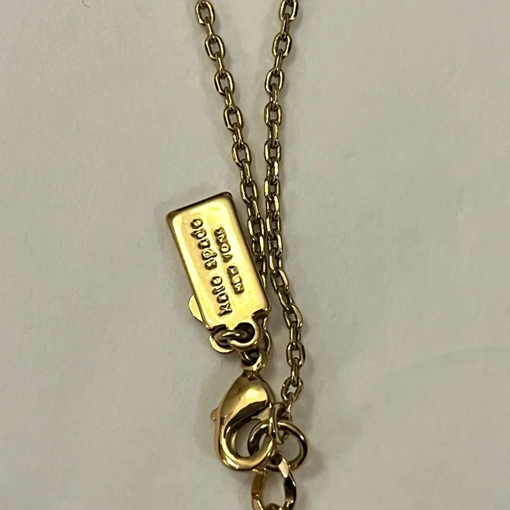 Kate Spade New York Gold-Tone Born To Be Wise One Cream Pendant Necklace